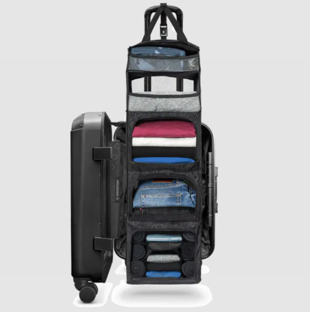 a suitcase with a folded clothes inside